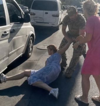 В Одессе людоловы протащили по асфальту женщину, которая пыталась спасти своего сына
